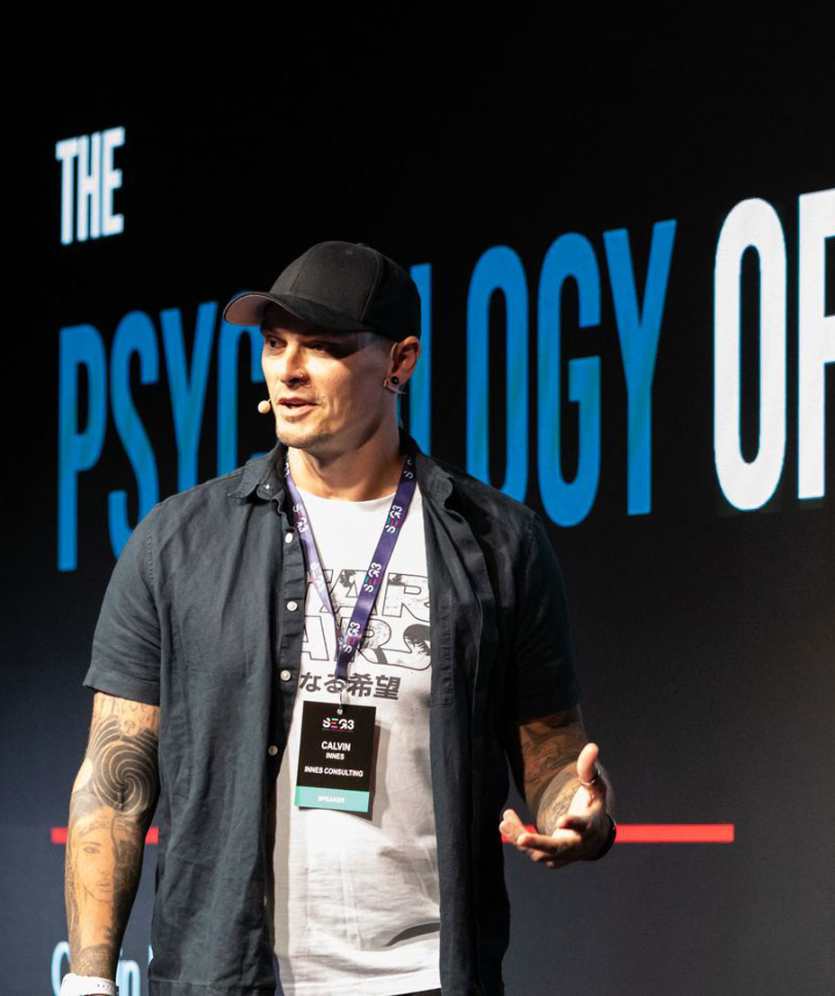 Calvin Innes delivering a keynote talk on stage